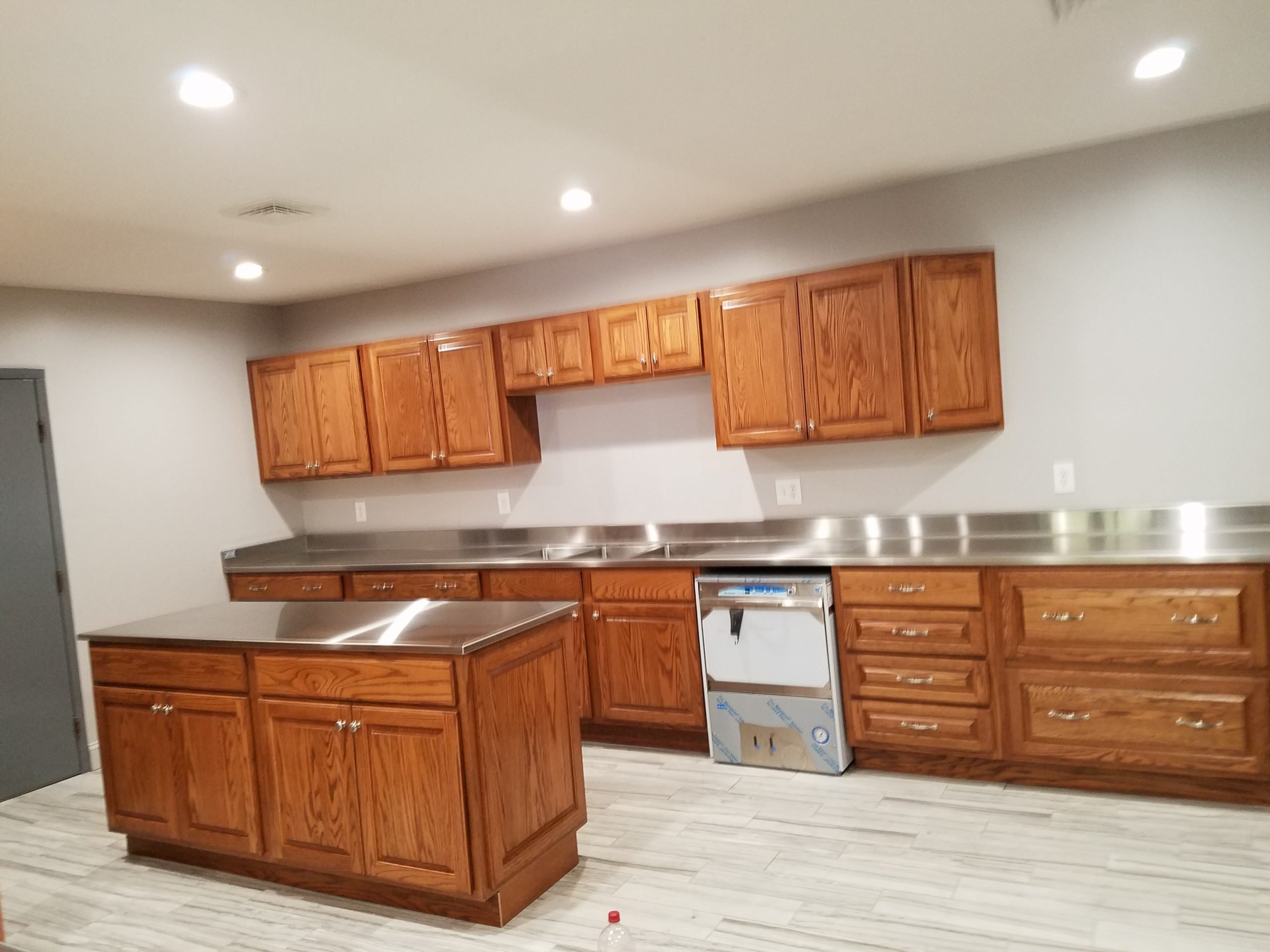 Custom Stainless Steel Top on Wood Cabinets