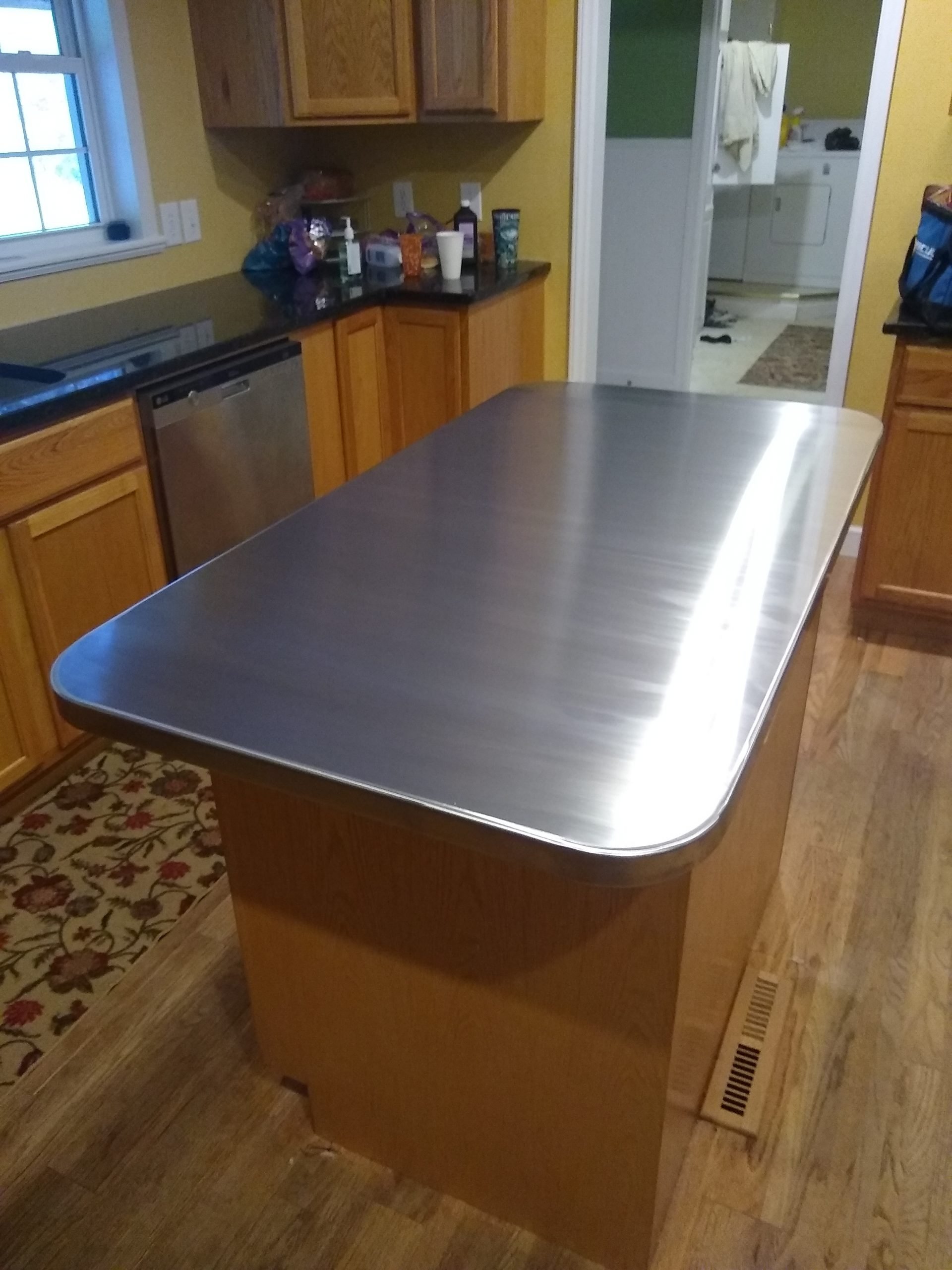 custom stainless steel island 1 in granite kitchen