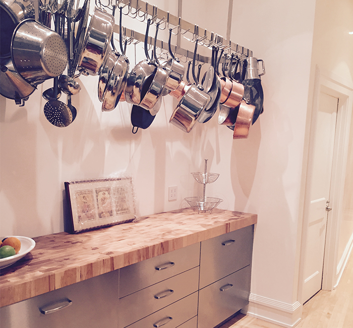 https://www.sfiforever.com/wp-content/uploads/2021/03/custom-stainless-steel-residential-base-cabinets-and-pot-rack-large-1.png